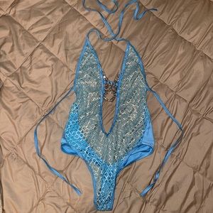 metallic light blue one piece net material stripper body suit w/ chain details